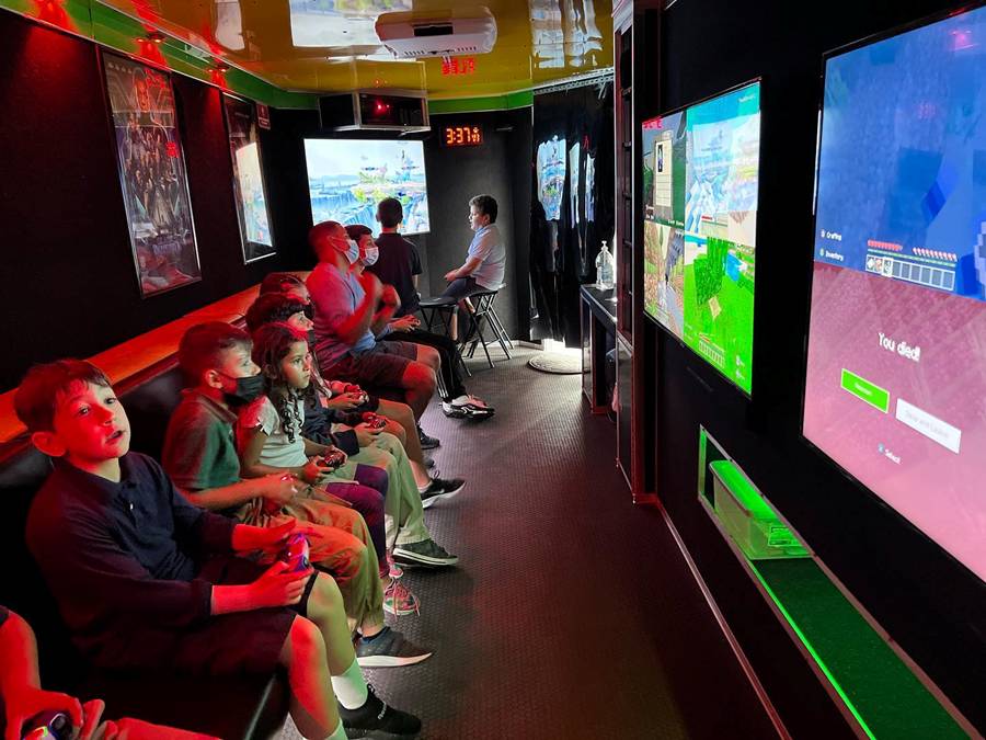 Kids in a video game truck, game trailer in Tampa, Clearwater